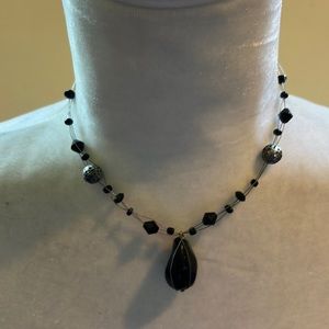 Black/silver toned beads necklace. Worn several times. Listing #7402